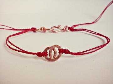 Bracciale artigianale unisex in rame e filo rosso